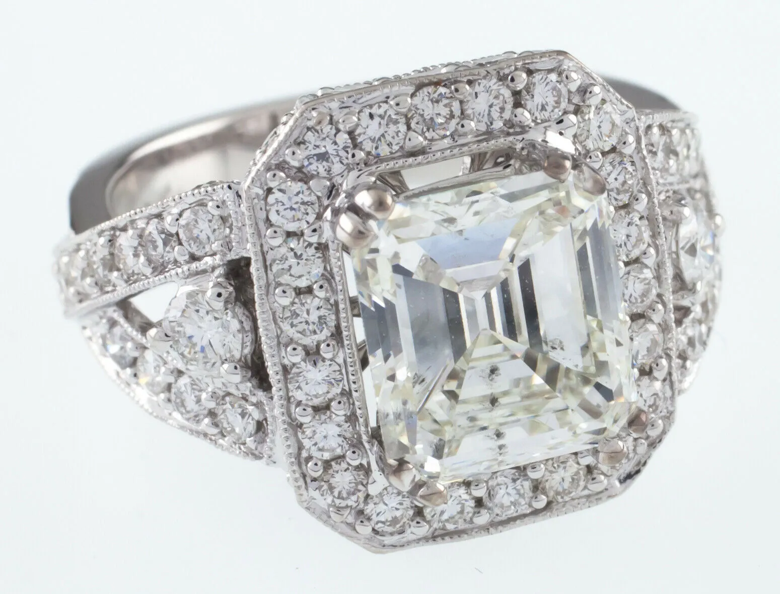 18k White Gold Emerald Cut Diamond Solitaire Ring w/ Accent Stones TDW = 4.5 ct