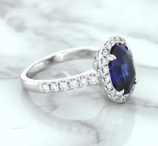 3.68ct. Oval GIA Certified Blue Sapphire Ring with Diamond Halo in 18K White Gold
