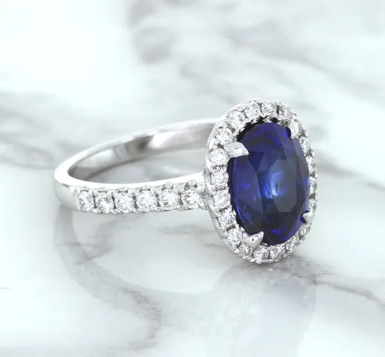 3.68ct. Oval GIA Certified Blue Sapphire Ring with Diamond Halo in 18K White Gold