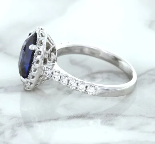 3.68ct. Oval GIA Certified Blue Sapphire Ring with Diamond Halo in 18K White Gold