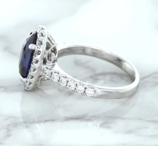 3.68ct. Oval GIA Certified Blue Sapphire Ring with Diamond Halo in 18K White Gold