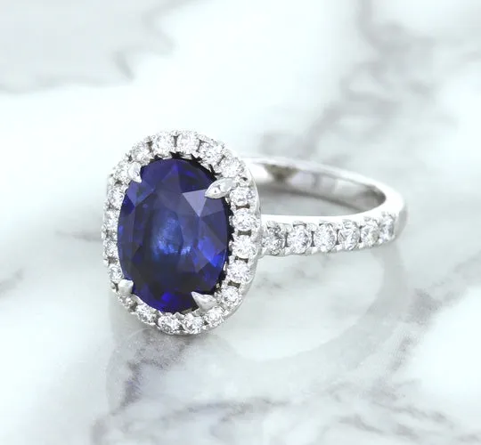 3.68ct. Oval GIA Certified Blue Sapphire Ring with Diamond Halo in 18K White Gold