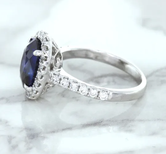 3.68ct. Oval GIA Certified Blue Sapphire Ring with Diamond Halo in 18K White Gold