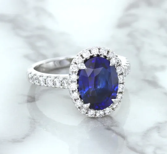 3.68ct. Oval GIA Certified Blue Sapphire Ring with Diamond Halo in 18K White Gold