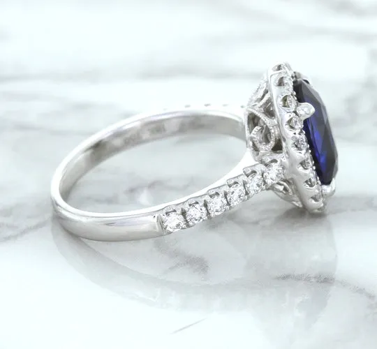 3.68ct. Oval GIA Certified Blue Sapphire Ring with Diamond Halo in 18K White Gold