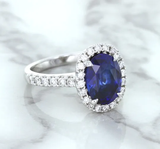 3.68ct. Oval GIA Certified Blue Sapphire Ring with Diamond Halo in 18K White Gold