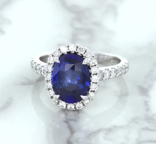 3.68ct. Oval GIA Certified Blue Sapphire Ring with Diamond Halo in 18K White Gold