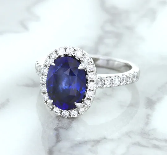 3.68ct. Oval GIA Certified Blue Sapphire Ring with Diamond Halo in 18K White Gold