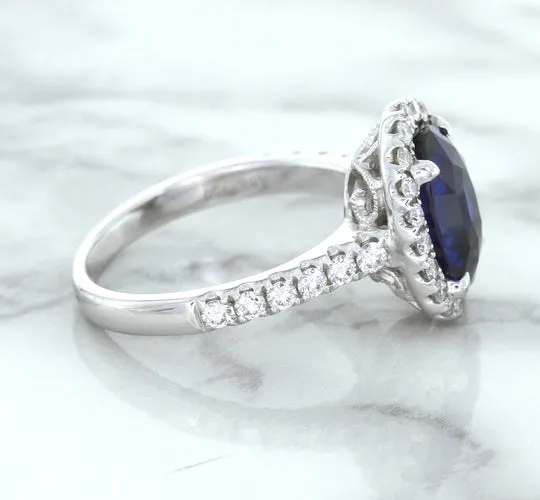 3.68ct. Oval GIA Certified Blue Sapphire Ring with Diamond Halo in 18K White Gold