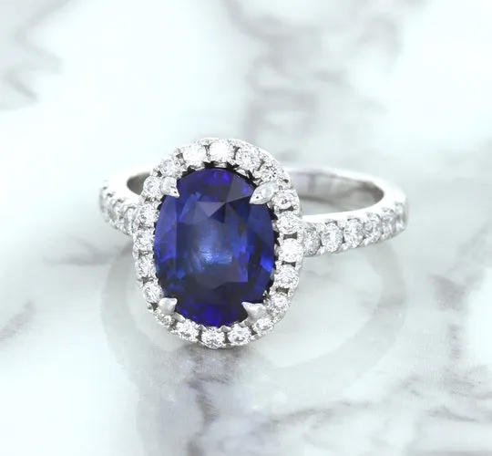 3.68ct. Oval GIA Certified Blue Sapphire Ring with Diamond Halo in 18K White Gold