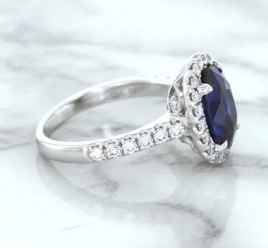 3.68ct. Oval GIA Certified Blue Sapphire Ring with Diamond Halo in 18K White Gold