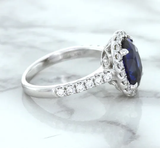 3.68ct. Oval GIA Certified Blue Sapphire Ring with Diamond Halo in 18K White Gold