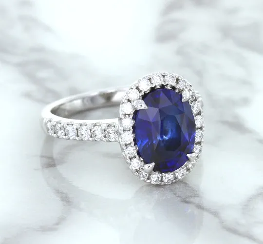 3.68ct. Oval GIA Certified Blue Sapphire Ring with Diamond Halo in 18K White Gold
