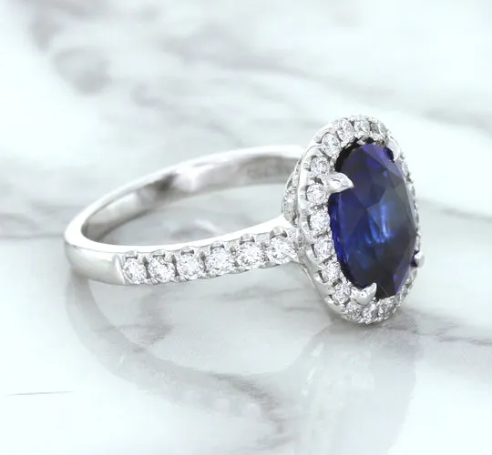 3.68ct. Oval GIA Certified Blue Sapphire Ring with Diamond Halo in 18K White Gold
