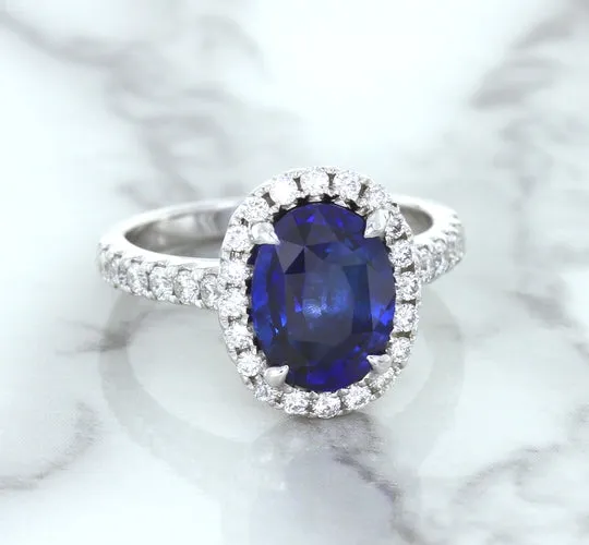 3.68ct. Oval GIA Certified Blue Sapphire Ring with Diamond Halo in 18K White Gold