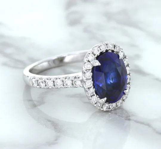 3.68ct. Oval GIA Certified Blue Sapphire Ring with Diamond Halo in 18K White Gold