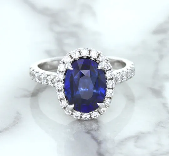 3.68ct. Oval GIA Certified Blue Sapphire Ring with Diamond Halo in 18K White Gold