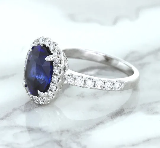 3.68ct. Oval GIA Certified Blue Sapphire Ring with Diamond Halo in 18K White Gold