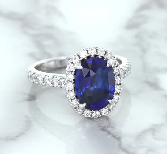 3.68ct. Oval GIA Certified Blue Sapphire Ring with Diamond Halo in 18K White Gold