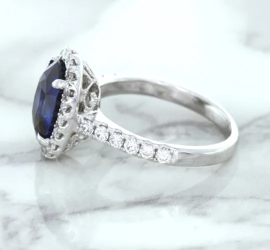 3.68ct. Oval GIA Certified Blue Sapphire Ring with Diamond Halo in 18K White Gold