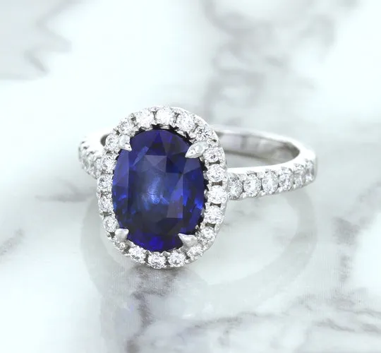 3.68ct. Oval GIA Certified Blue Sapphire Ring with Diamond Halo in 18K White Gold