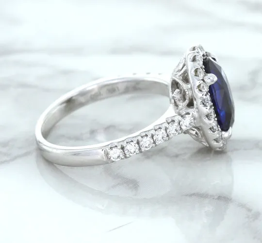 3.68ct. Oval GIA Certified Blue Sapphire Ring with Diamond Halo in 18K White Gold