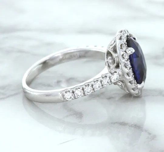 3.68ct. Oval GIA Certified Blue Sapphire Ring with Diamond Halo in 18K White Gold