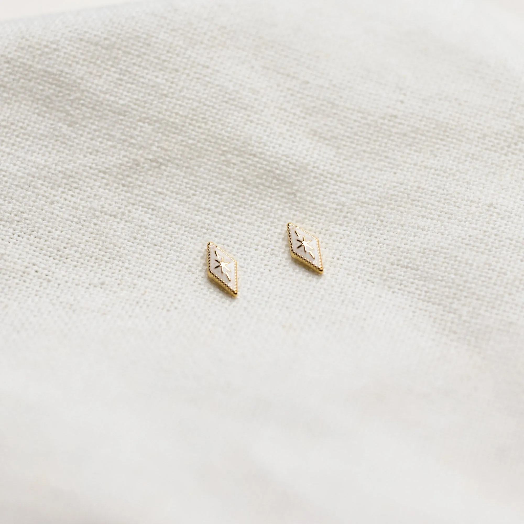 Dogma Studs