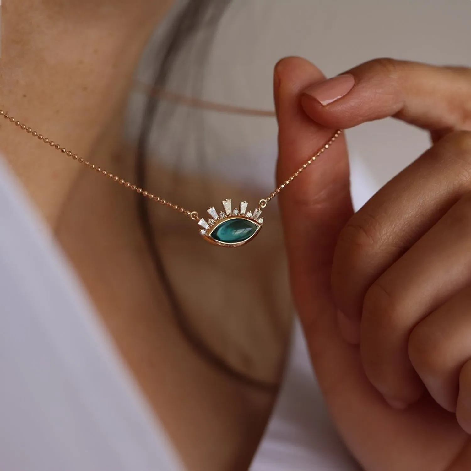 EMERALD EVIL EYE NECKLACE