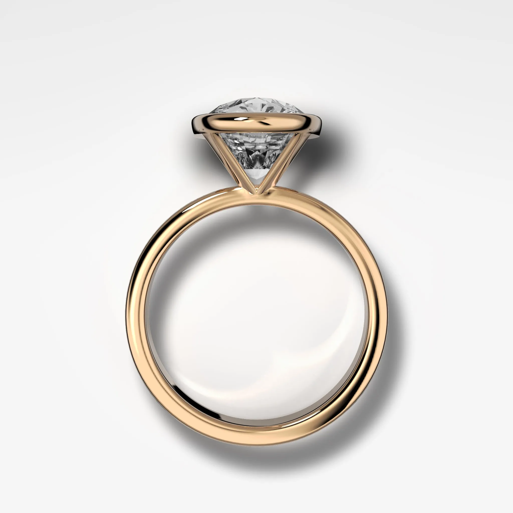 Finest Bezel Set Engagement Ring With Elongated Cushion Cut Diamond
