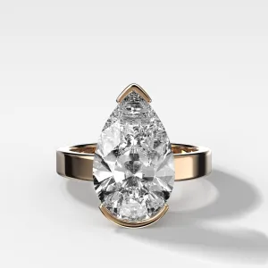 Finest Half Bezel Solitaire Engagement Ring With Pear Cut Diamond