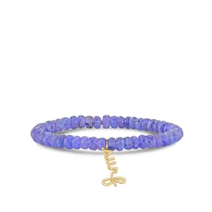 Gold & Diamond Surf Script on Tanzanite