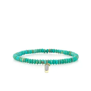 Gold & Diamond Tequila Shot on Turquoise