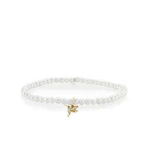 Gold & Diamond Tiny Hummingbird on Pearls
