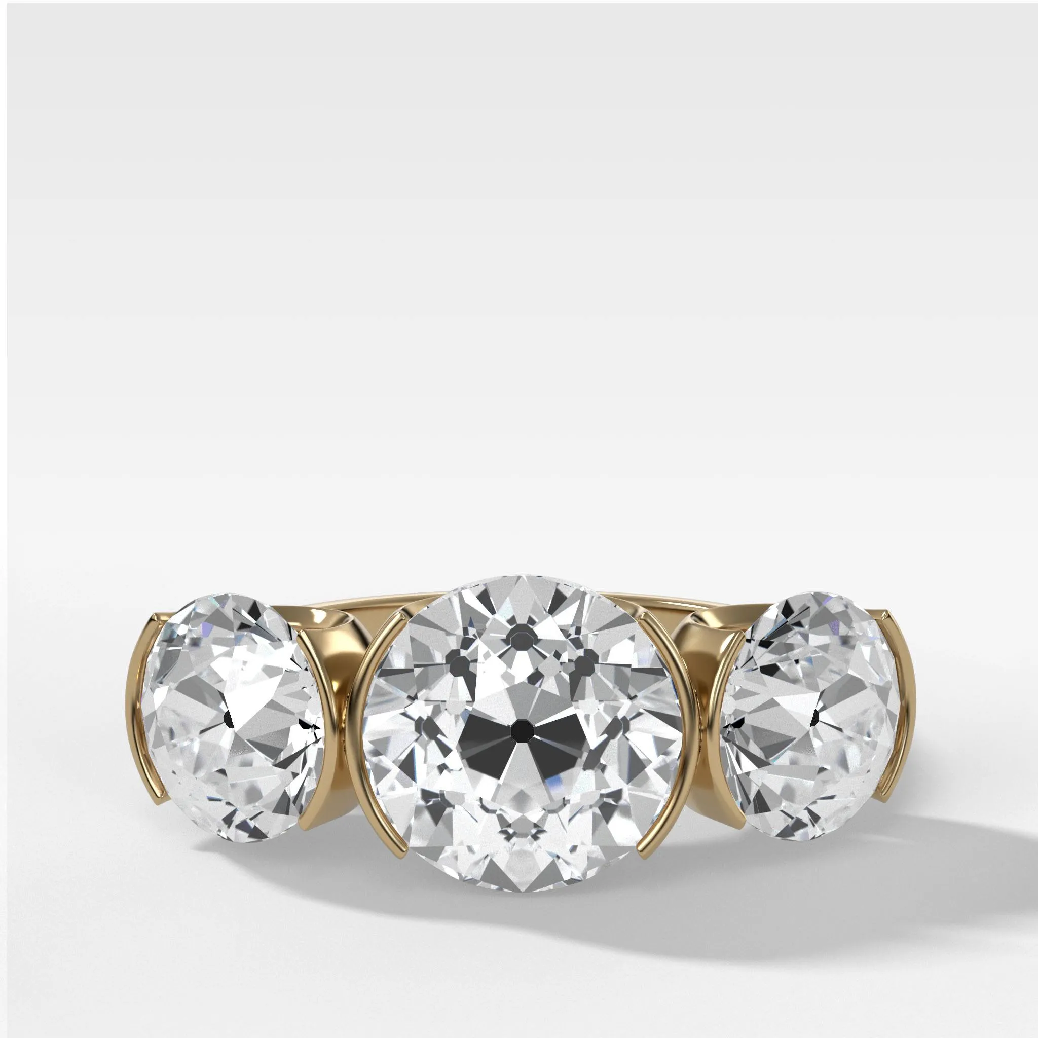 Half Bezel Triad Engagement Ring With Old Euro Cut Diamonds