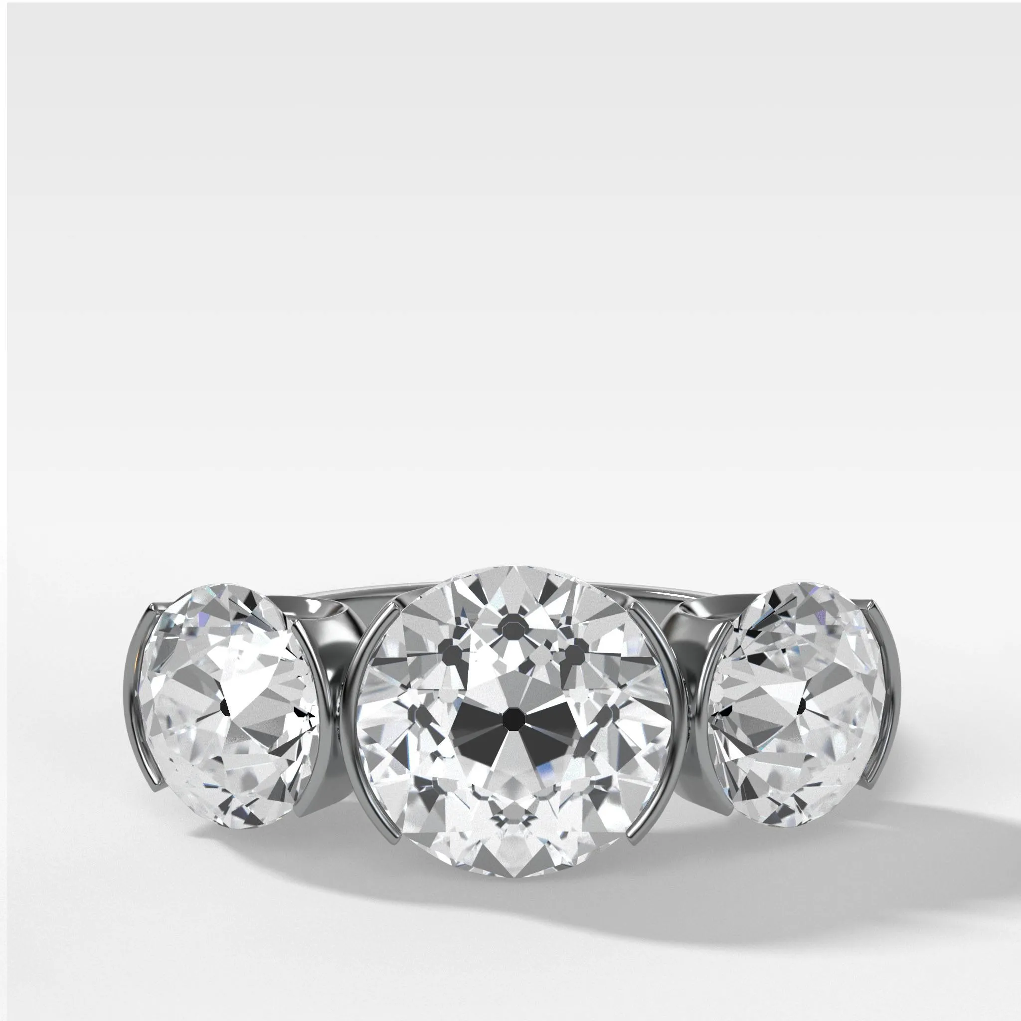 Half Bezel Triad Engagement Ring With Old Euro Cut Diamonds