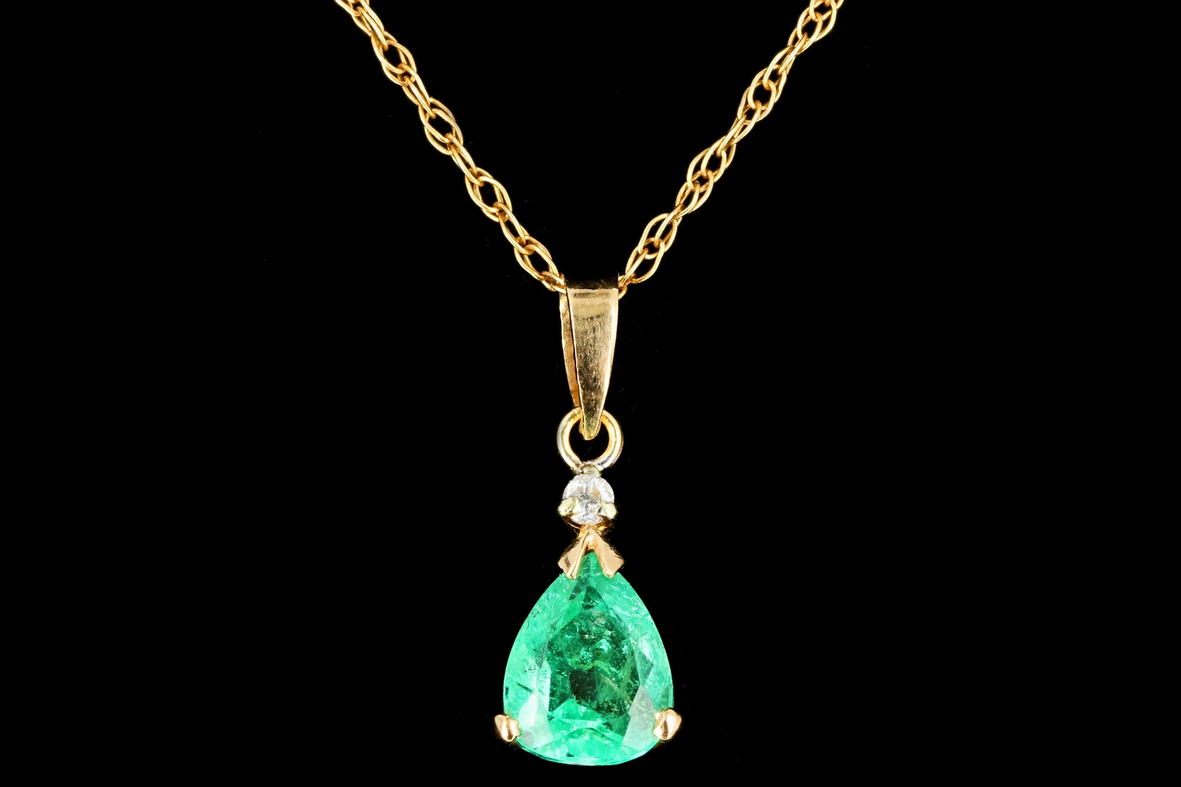 Modern 14K Yellow Gold .58 CTR Light Green Emerald and Diamond Pendant Necklace