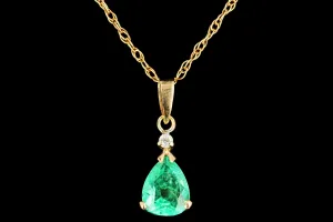 Modern 14K Yellow Gold .58 CTR Light Green Emerald and Diamond Pendant Necklace
