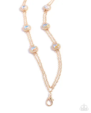 Pocketful of Sunshine - Gold - Emerald Cut Iridescent Gem Paparazzi Lanyard Necklace