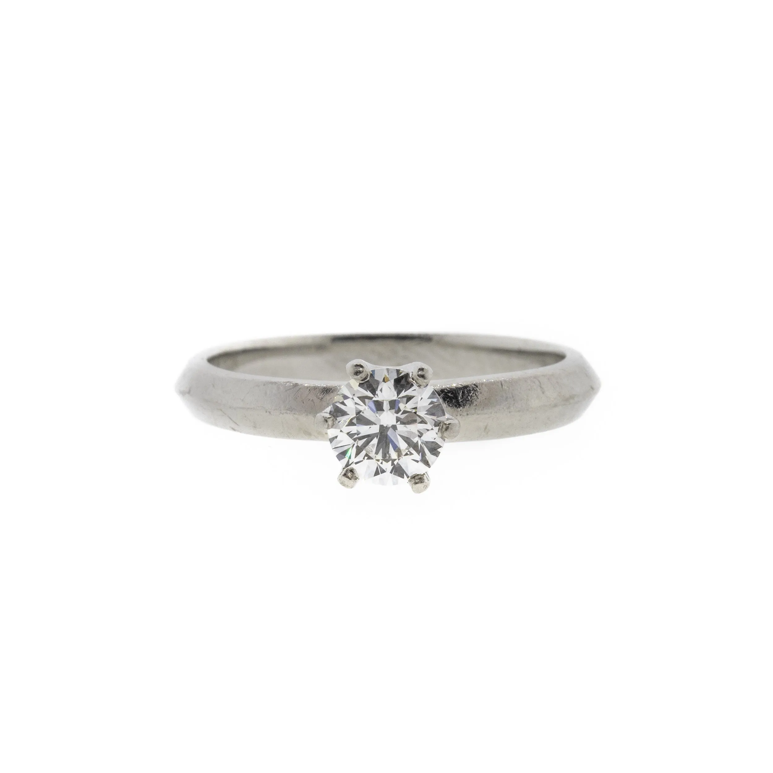 Round Brilliant Diamond and Knife Edge Platinum Ring