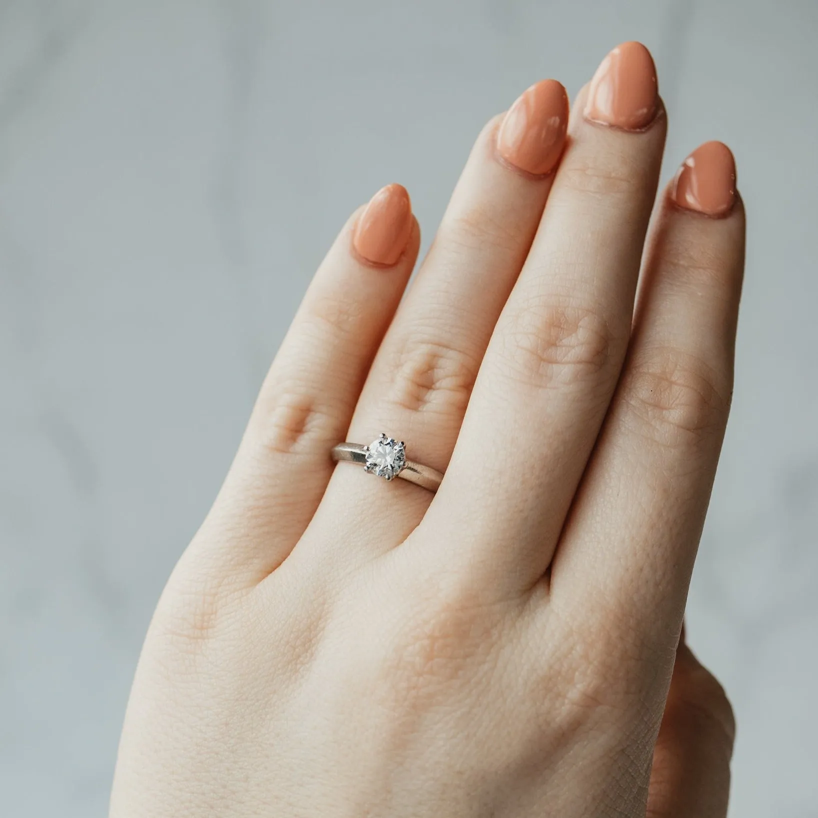 Round Brilliant Diamond and Knife Edge Platinum Ring