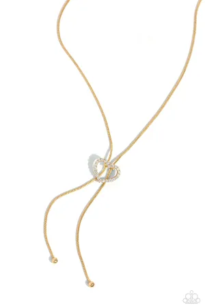 Tempting Tassel - Gold - White Rhinestone Heart Paparazzi Bolo Short Necklace
