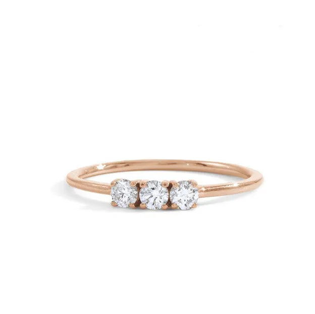triple white diamond ring- 14k rose gold-  size 5.5