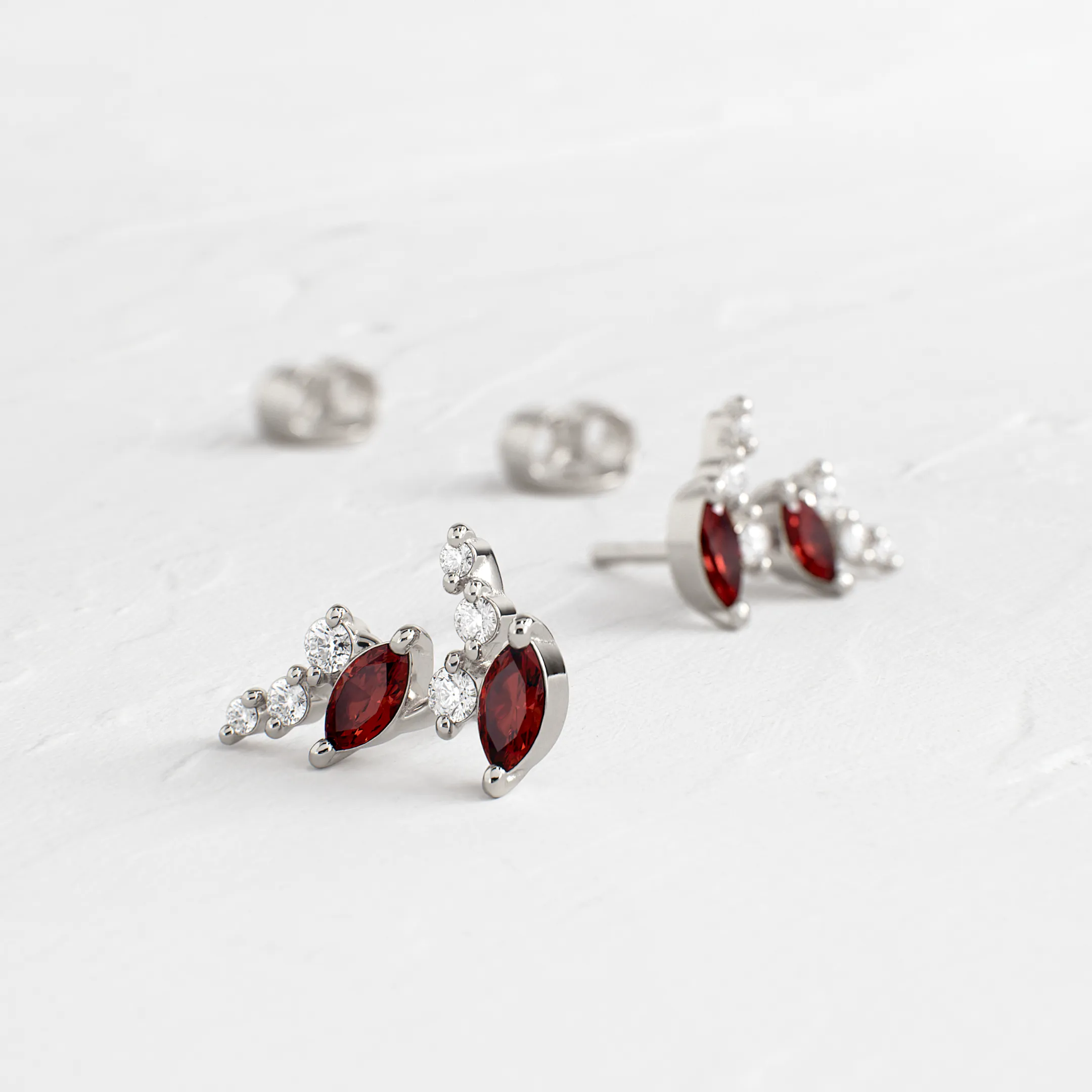 Unfurl Climber Studs in Garnet