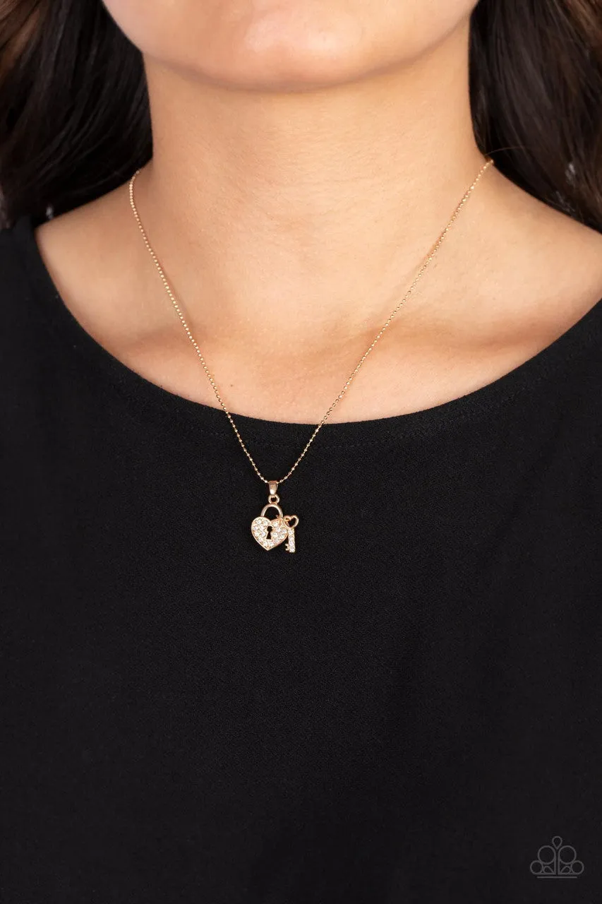 You Hold My Heart - Gold - White Rhinestone Heart Key Paparazzi Short Dainty Necklace